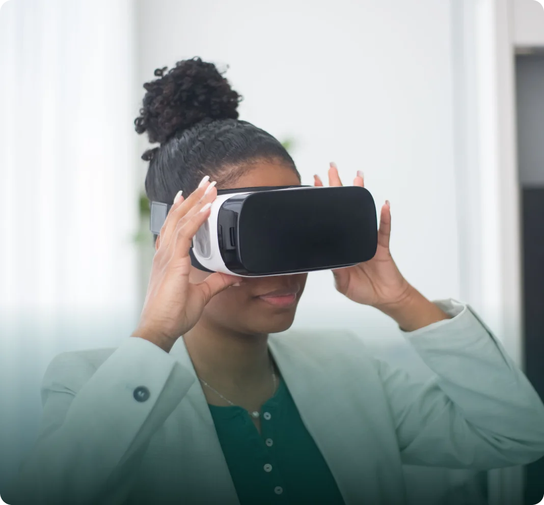 Healthcare innovator exploring technology through a virtual-reality headset